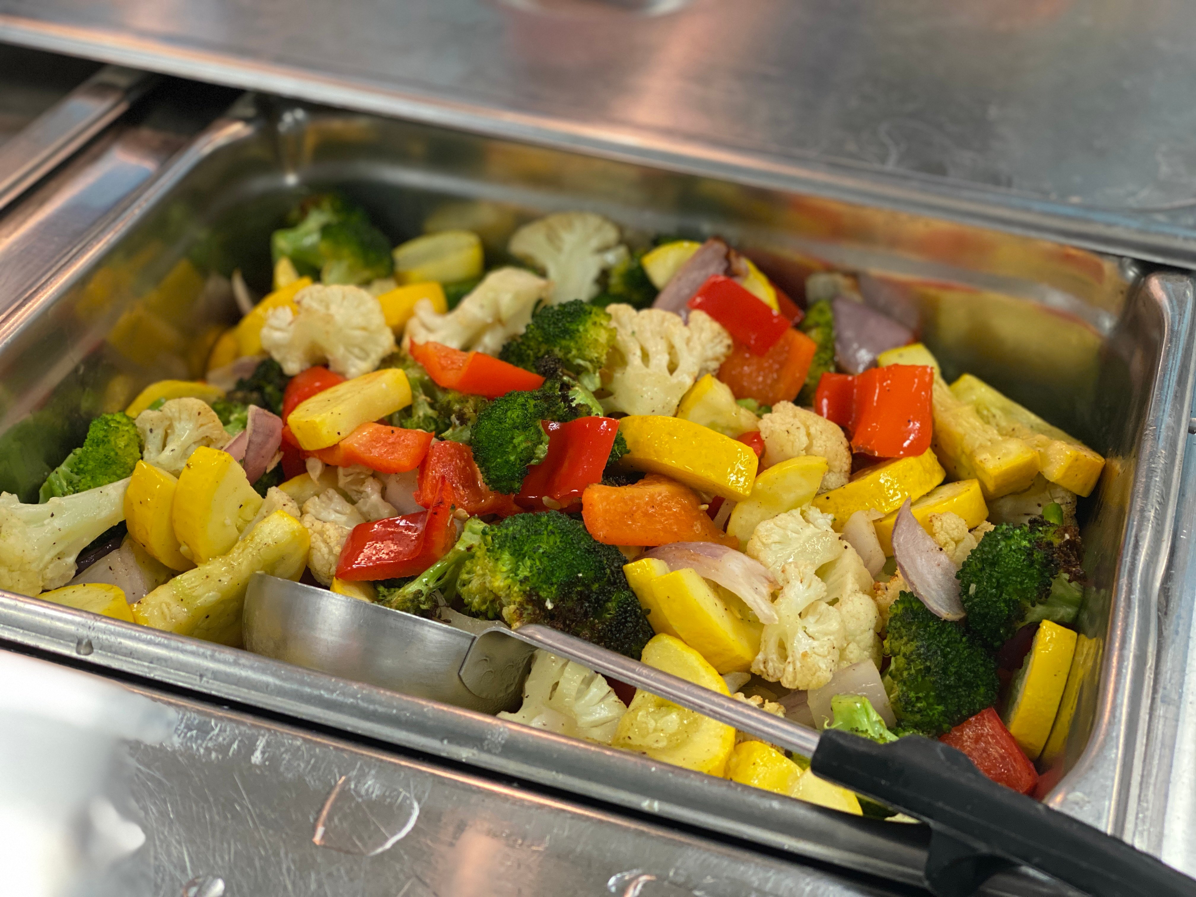 Roasted vegetables on the lunch line.