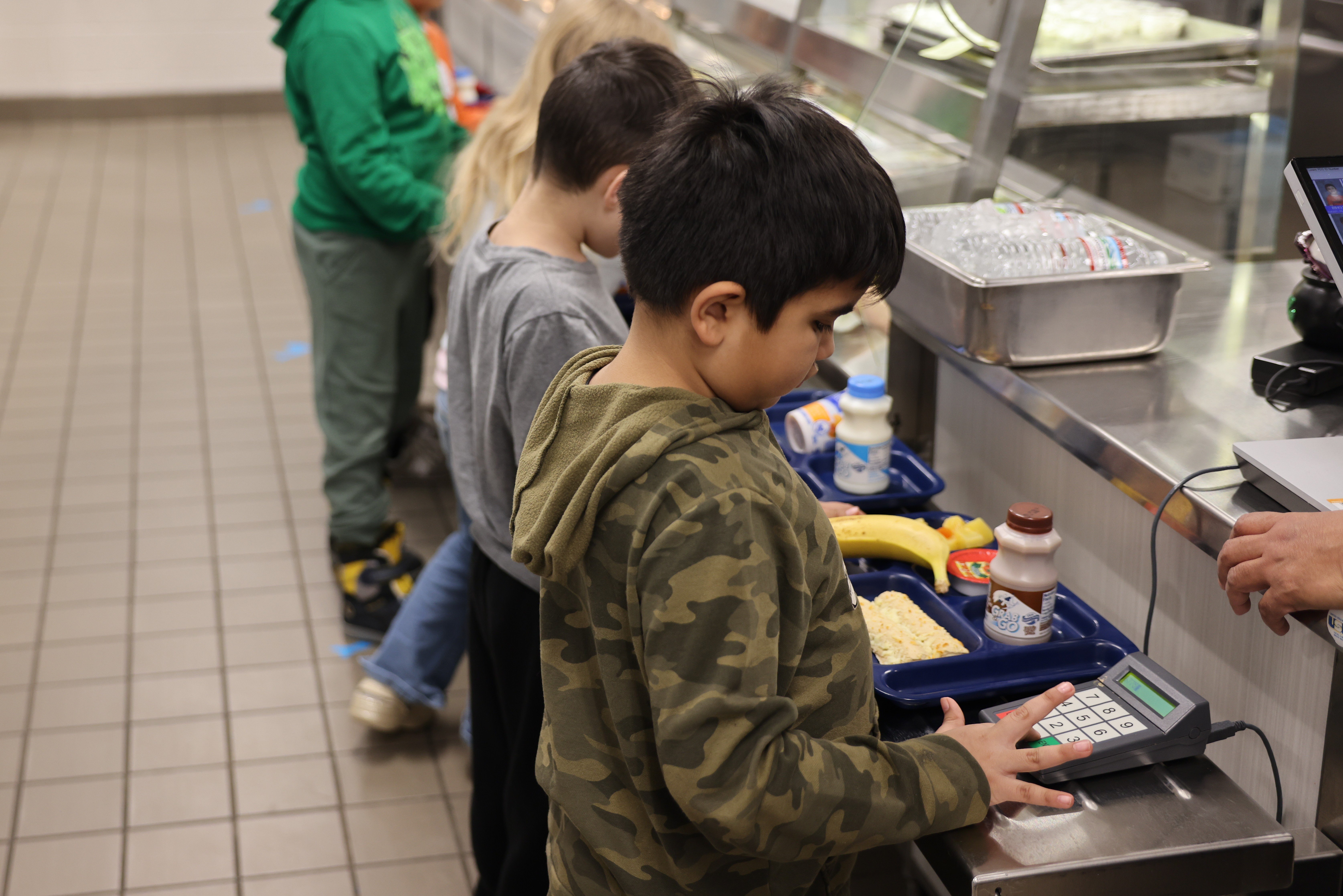 Student receiving lunch.