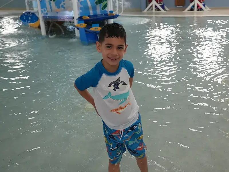 Child in the activities pool at the PWCS Aquatics Center