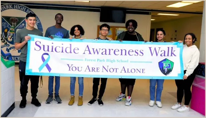 Forest Park High School students with Suicide Awareness Walk sign