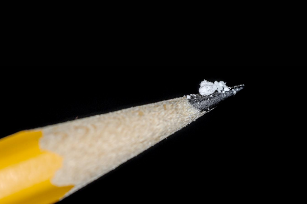 photo of a lethal dose of fentanyl on the tip of a pencil