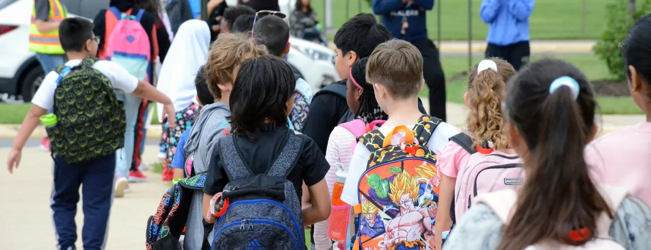 photo of students entering school