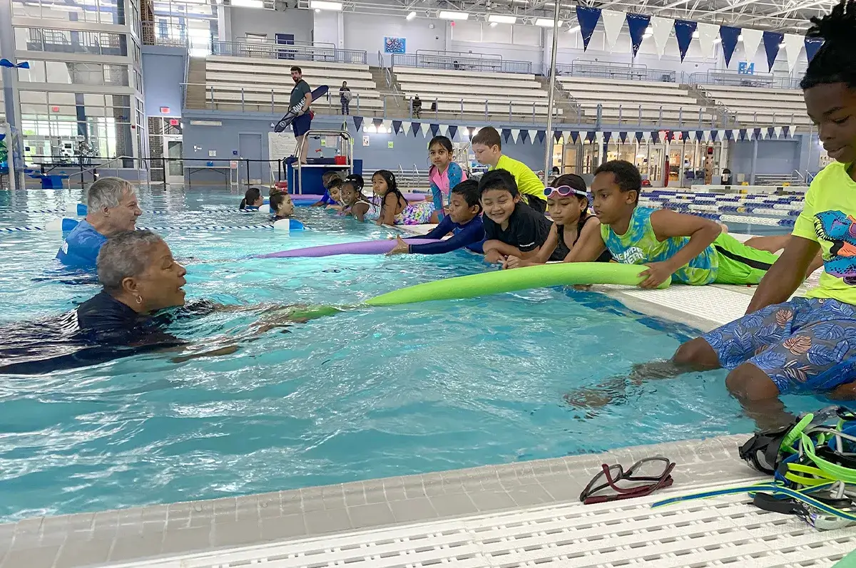 Children learning to swim at the PWCS Aquatics Center