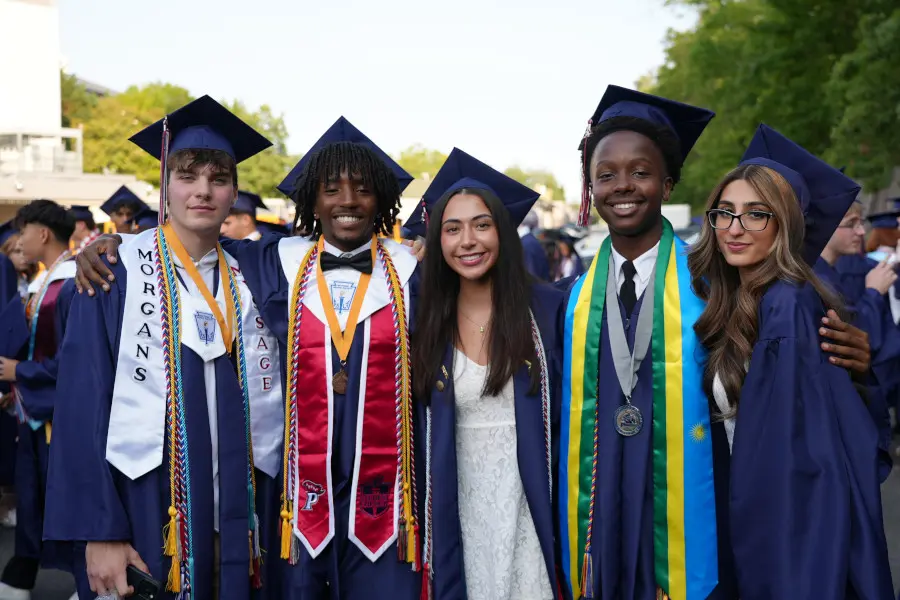 Students wearing the cap and gowns at the 2025 Patriot High School graduation ceremony