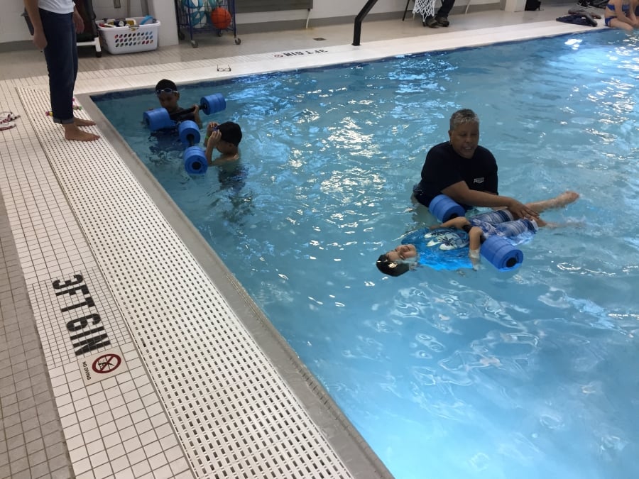 Students in the pool during Water Safety School