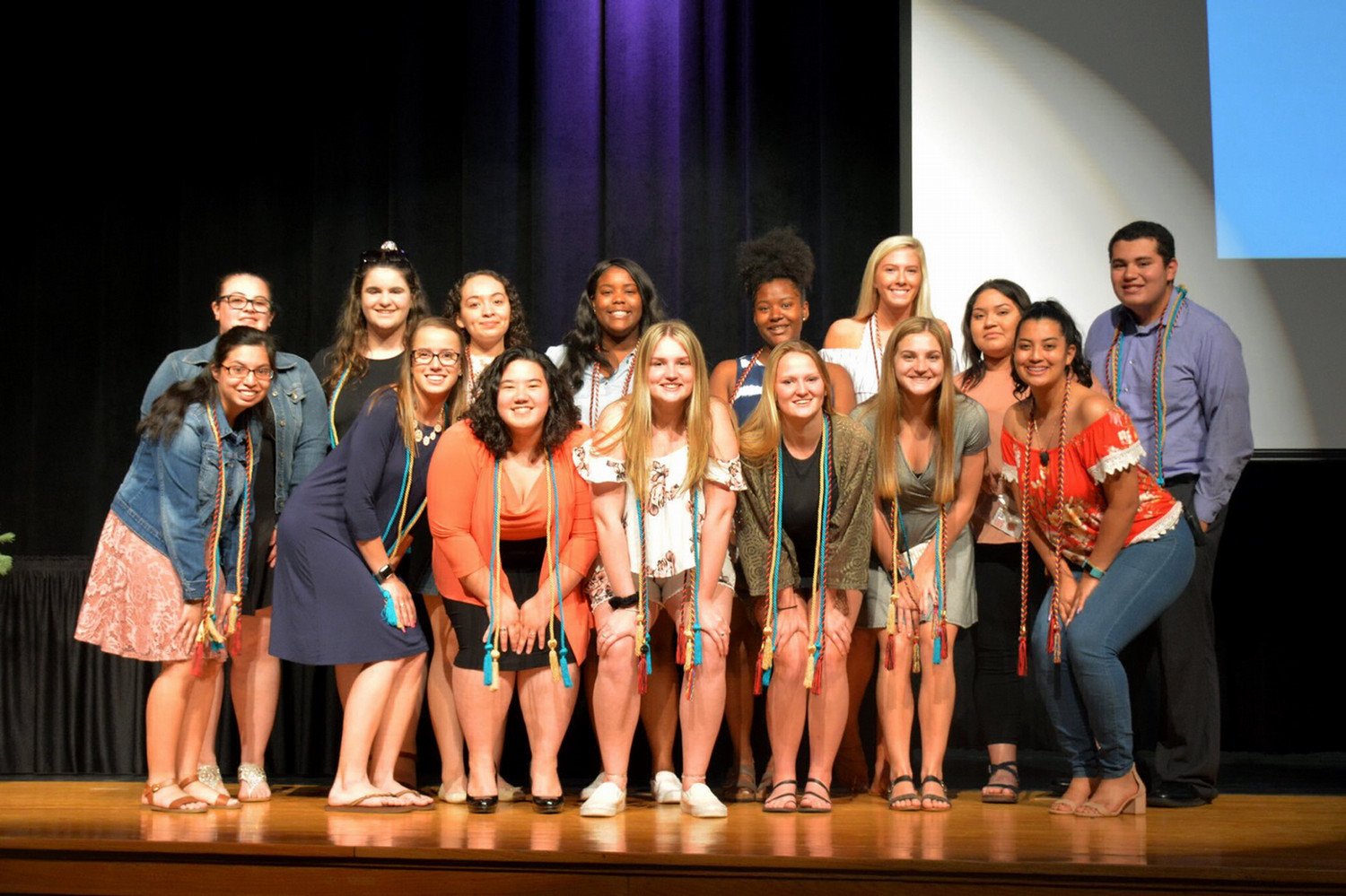 Group photo of 2019 Osbourn Park High School graduates on a stage