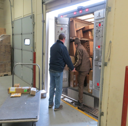 Supply services staff loading a truck