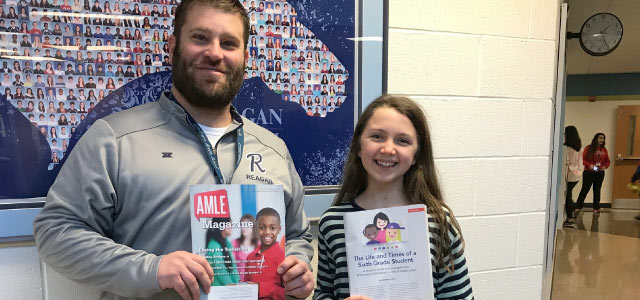 photo of Reagan Middle School 7th grader Annabelle Kier with Principal Joe Murgo and her published article
