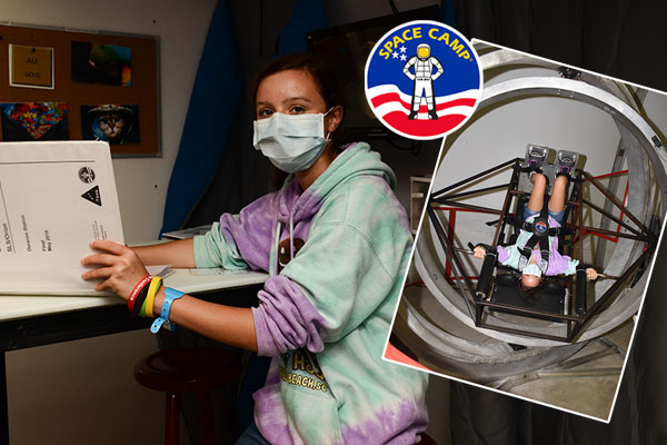 Isabella sitting at a desk. Insert picture of Allen in gravity chair. Space Academy logo.