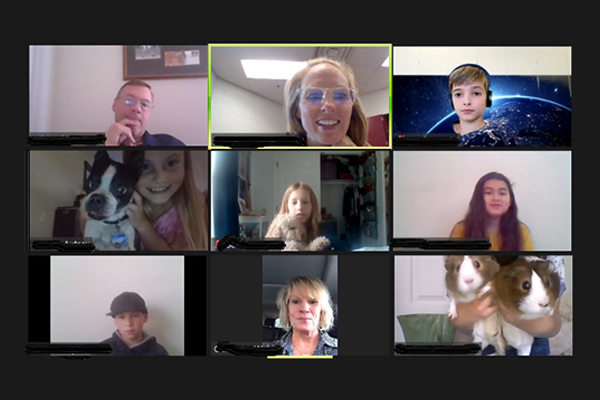 Screenshot of Signal Hill Elementary School teacher Michael Parker and his students have a social time meeting on zoom