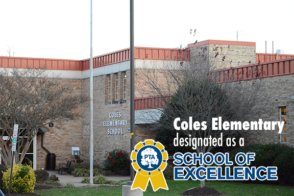 Coles Elementary School entrance with text overlaid: Coles Elementary designated as a School of Excellence