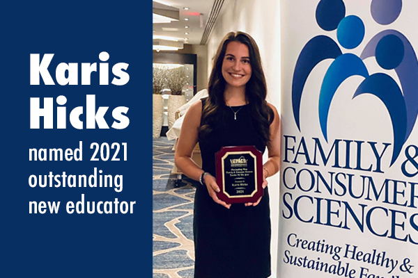 Smiling nearly full-length photo of Gar-Field High School teacher Karis Hicks holding her outstanding new teacher of 2021 award plaque from Family and Consumer association