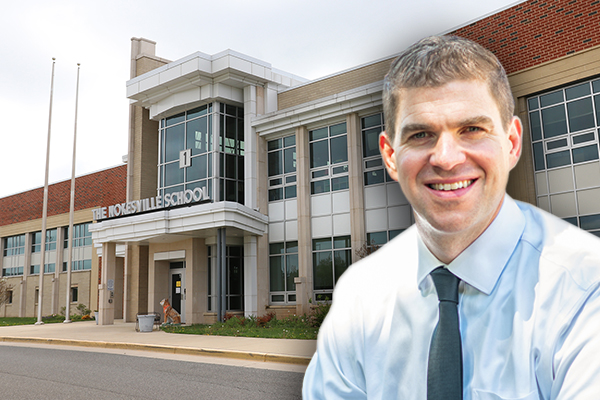 Principal Andy Jacks in front of The Nokesville School