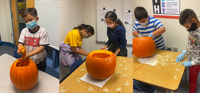 Featherstone Elementary School students carving pumpkins