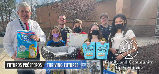 Group of Penn Elementary School students and staff holding donations for the Prince William County Animal Shelter