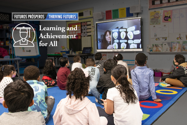 Photo of students in classing. Tagline: Learning and Achievement for all.