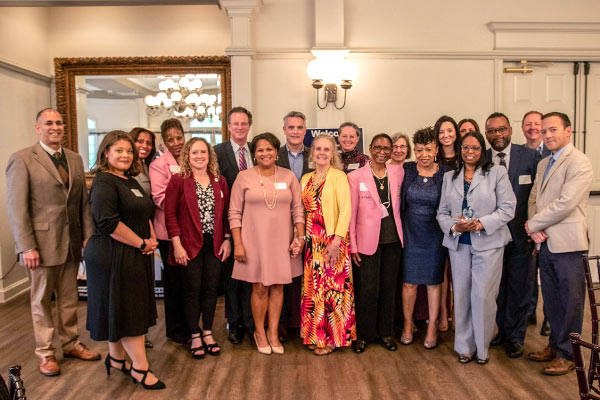 Group of attendees at a SPARK dinner recognizing business partnerships