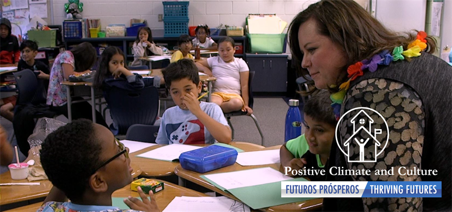 Jennifer Hoffower standing in a classroom in front of students