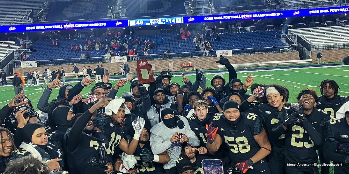 Freedom High School football team poses with state championship trophy