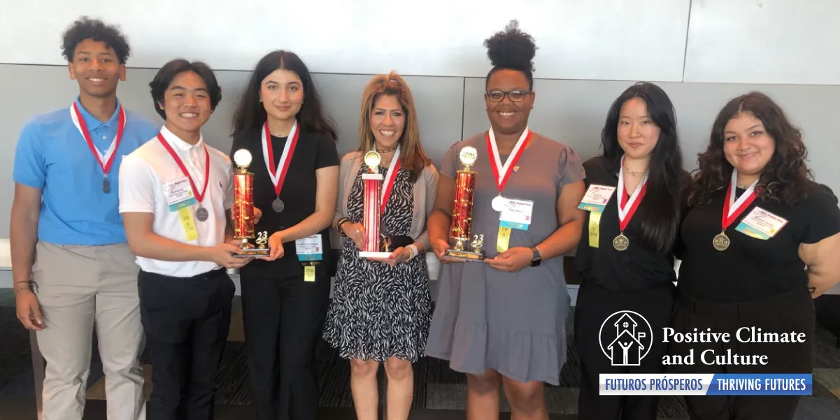 Members of Forest Park High Schools Family, Career and Community Leaders of America chapter holding trophy won at state competition