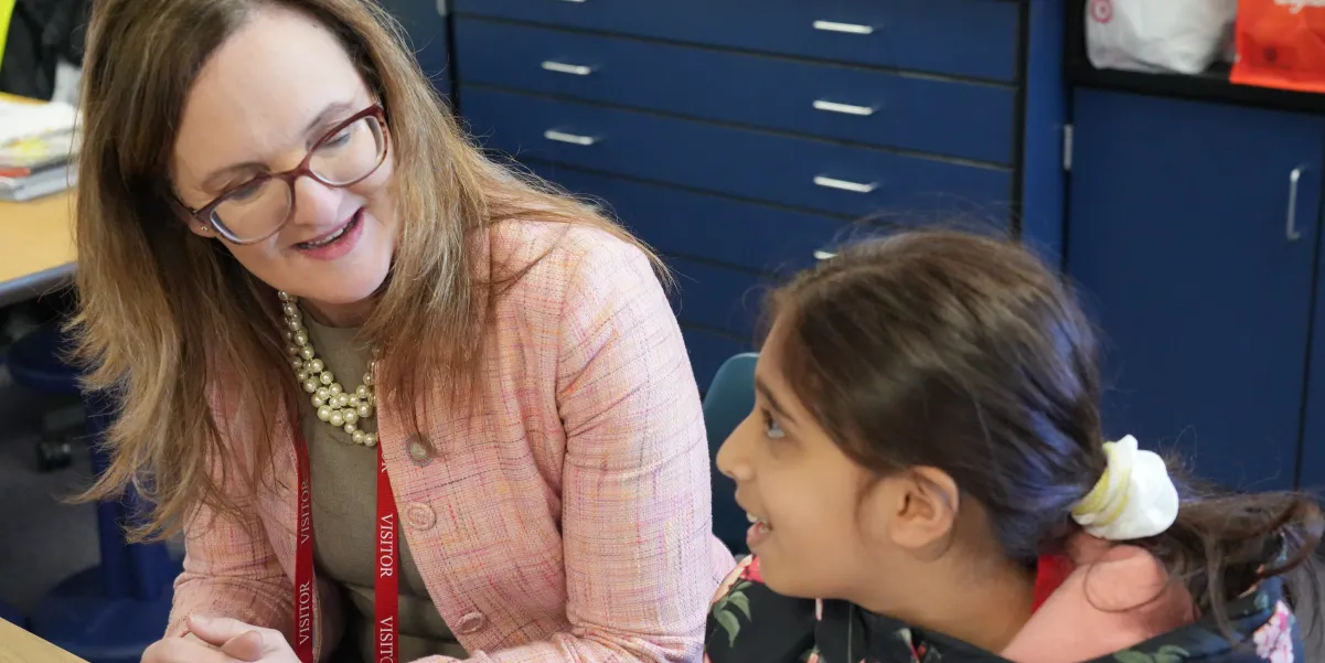 Virginia Superintendent of Public Instruction Dr. Lisa Coons  with student