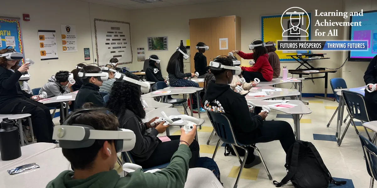 Students in a classroom with virtual reality headsets on 