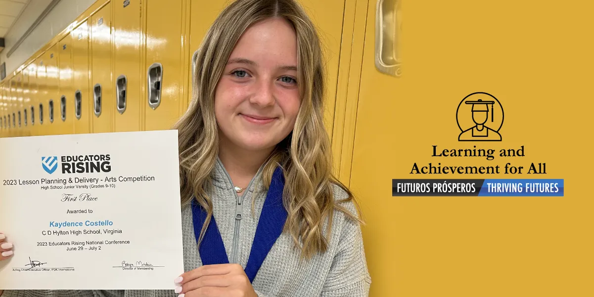 Kaydence Costello holding her award