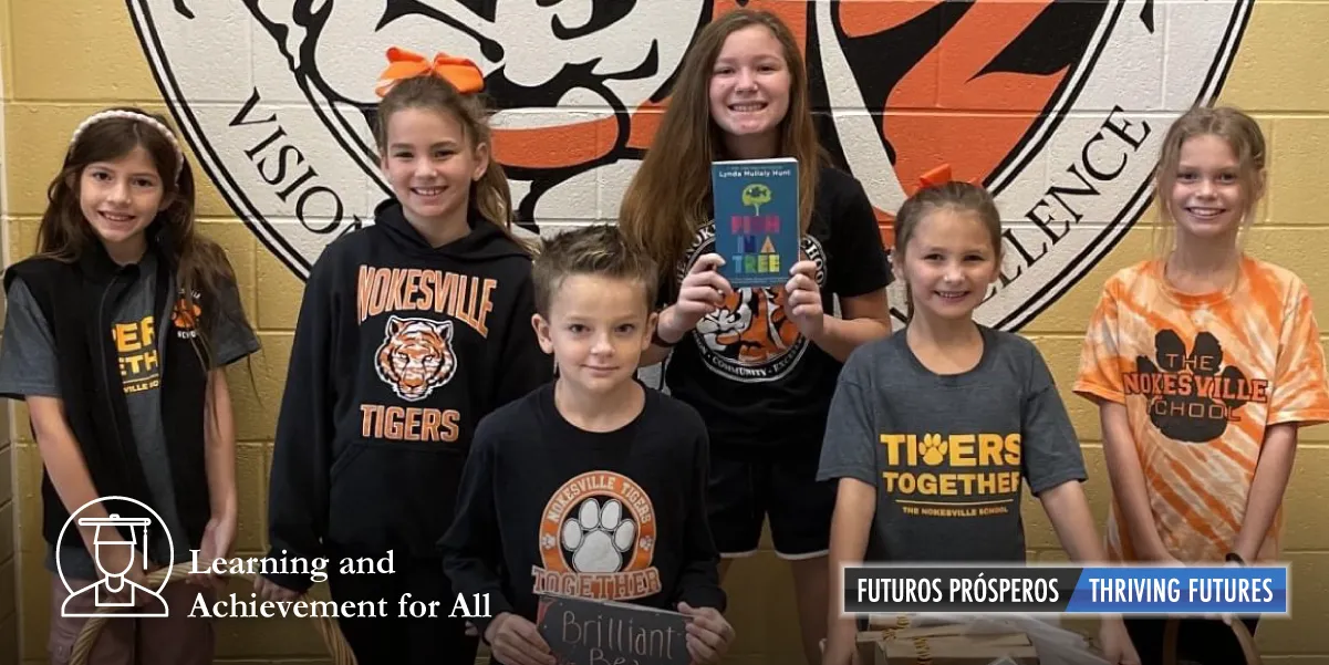 Six Nokesville School students holding books