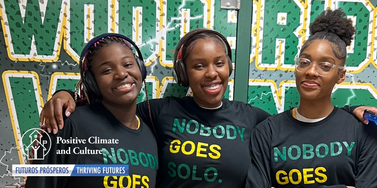 three basketball teammates wearing shirts that say nobody goes solo