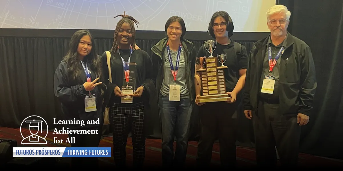 Colgan High School team posing with their award