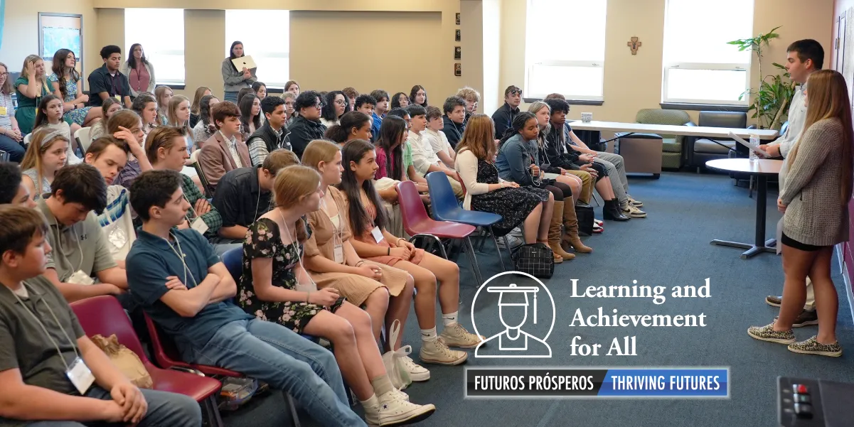 Students listening to a speaker