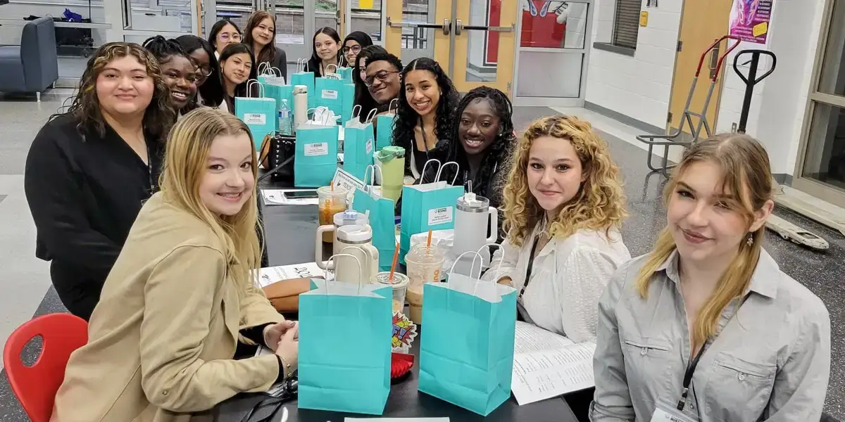 High school students, who are aspiring teachers, seated at the Educators Rising® Student Leadership Conference hosted at Potomac Shores Middle School