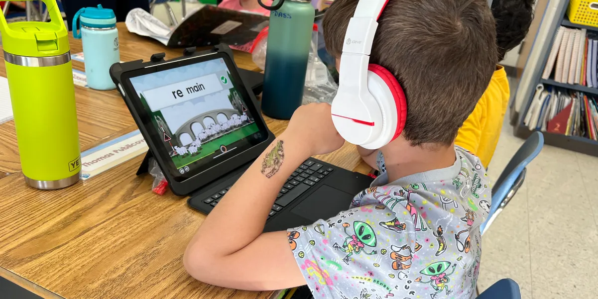 Student working on an iPad in class