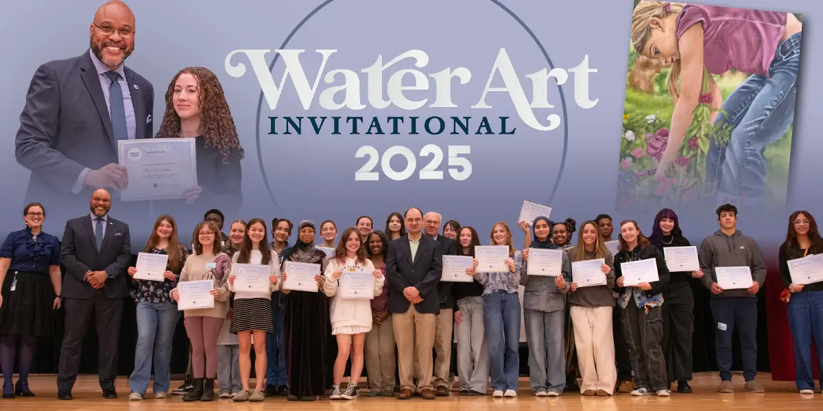 2025 Water Art Invitations winner standing on stage holding their award certificates