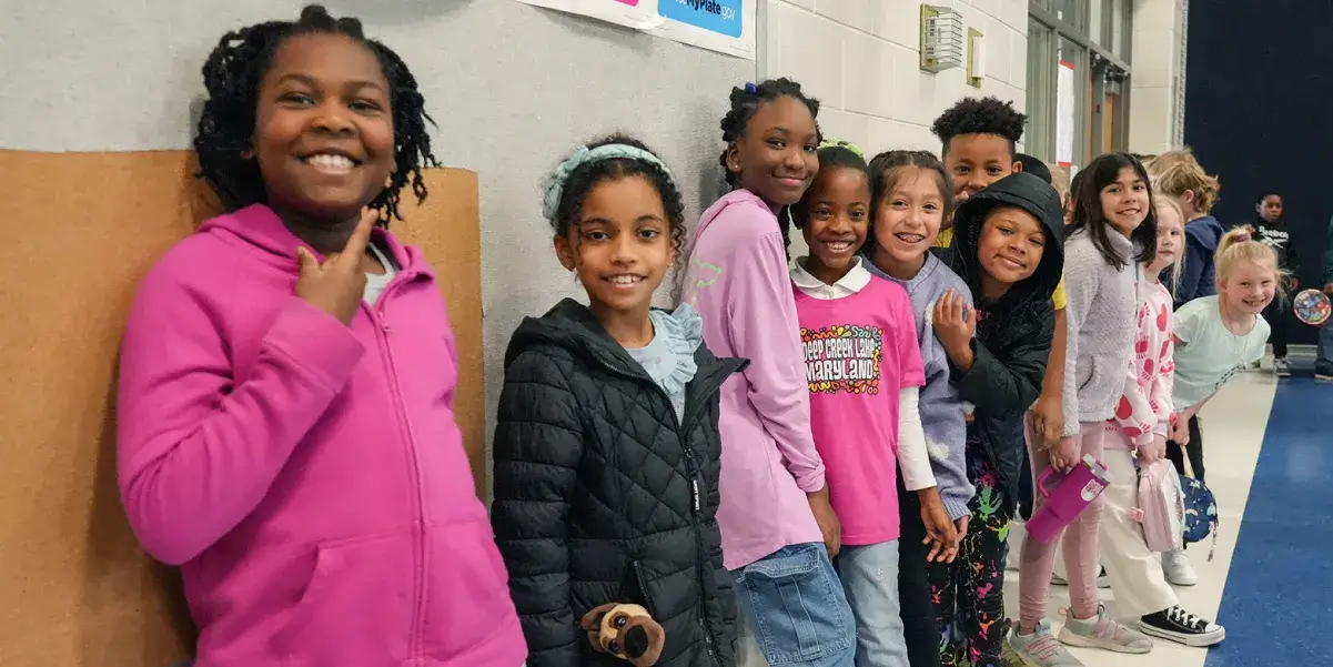 Elementary school students lined up to go outside for recess