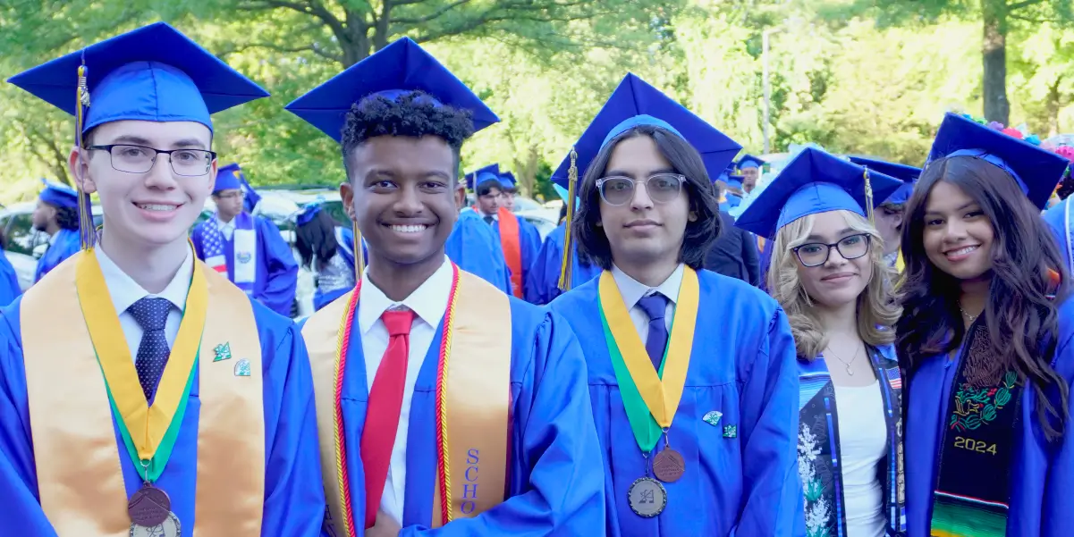 PWCS students wearing caps and gowns on graduation day
