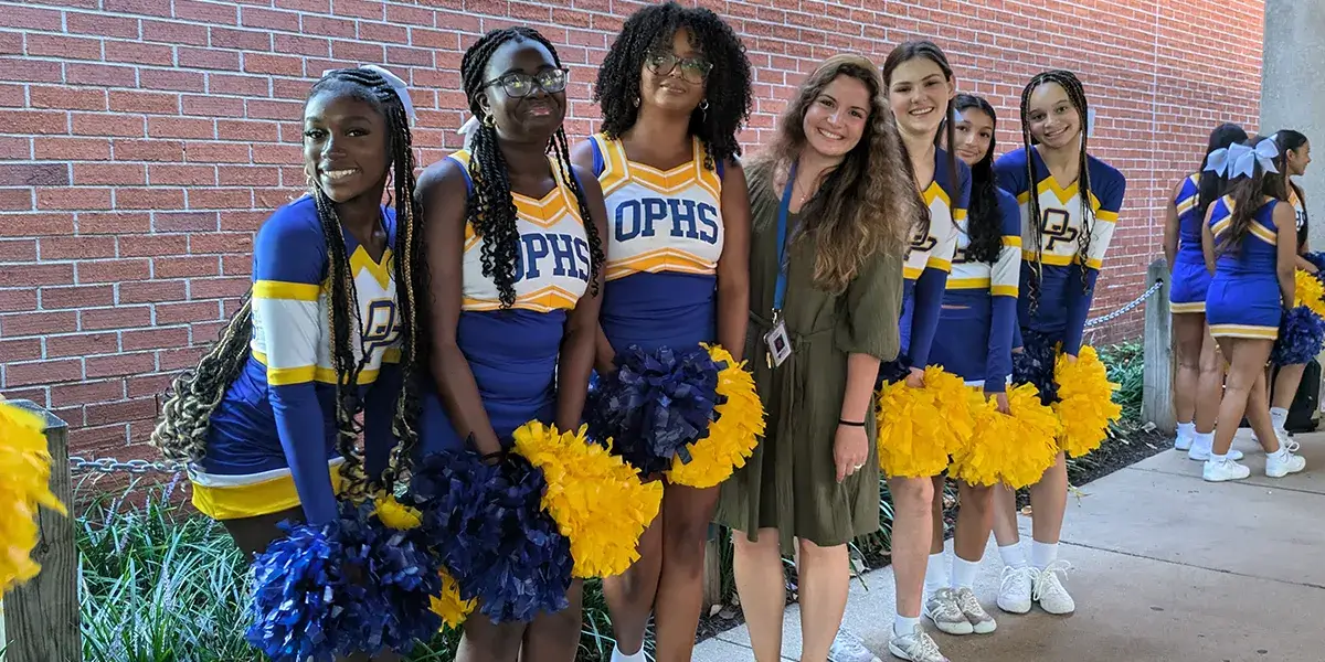 Osbourn Park High School cheerleaders helping pump up students and staff on the first day of school