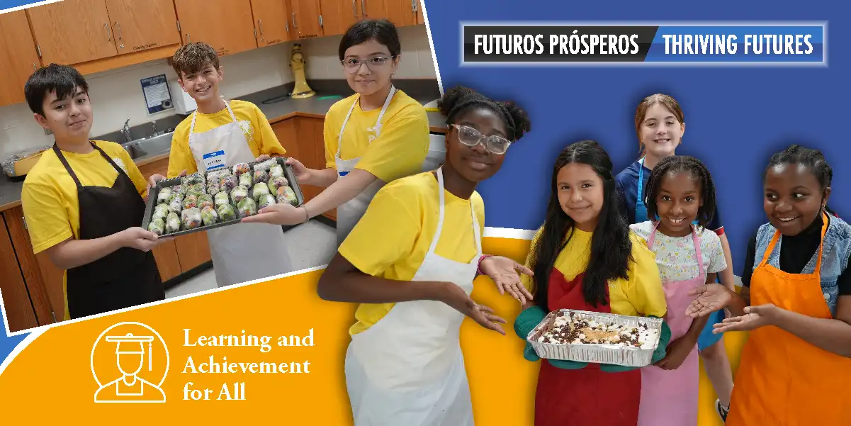 Groups of children holding their culinary creations.