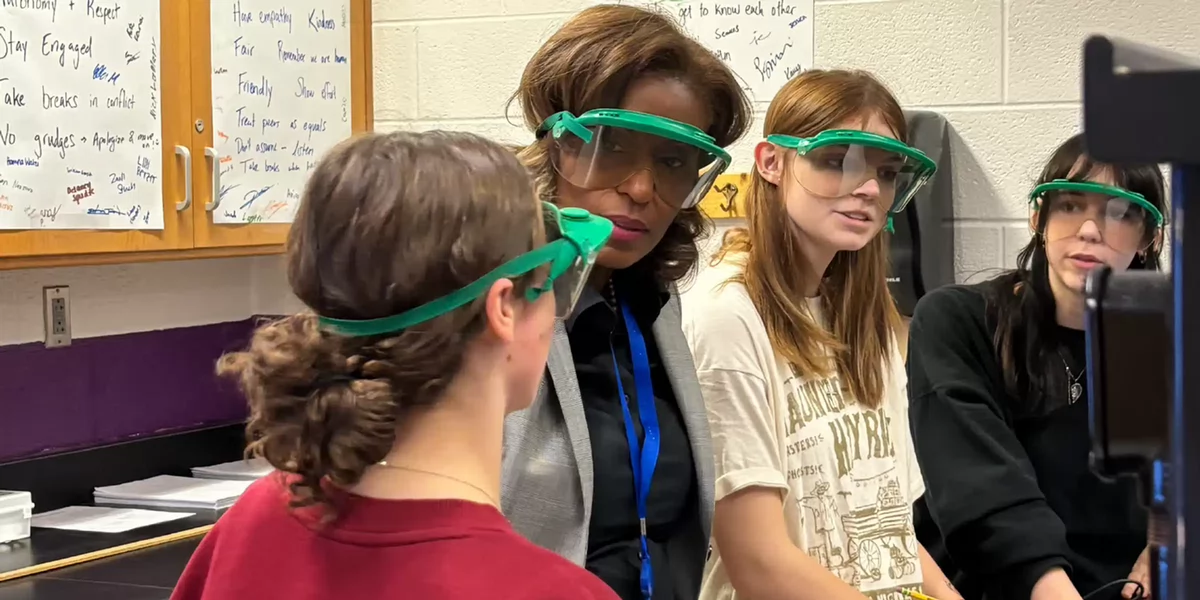 Photo of Dr. McDade with science students