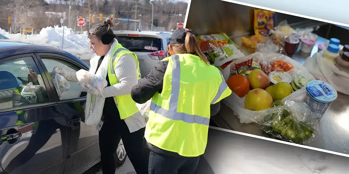PWCS Food and Nutrition staff distributing meal kits to families