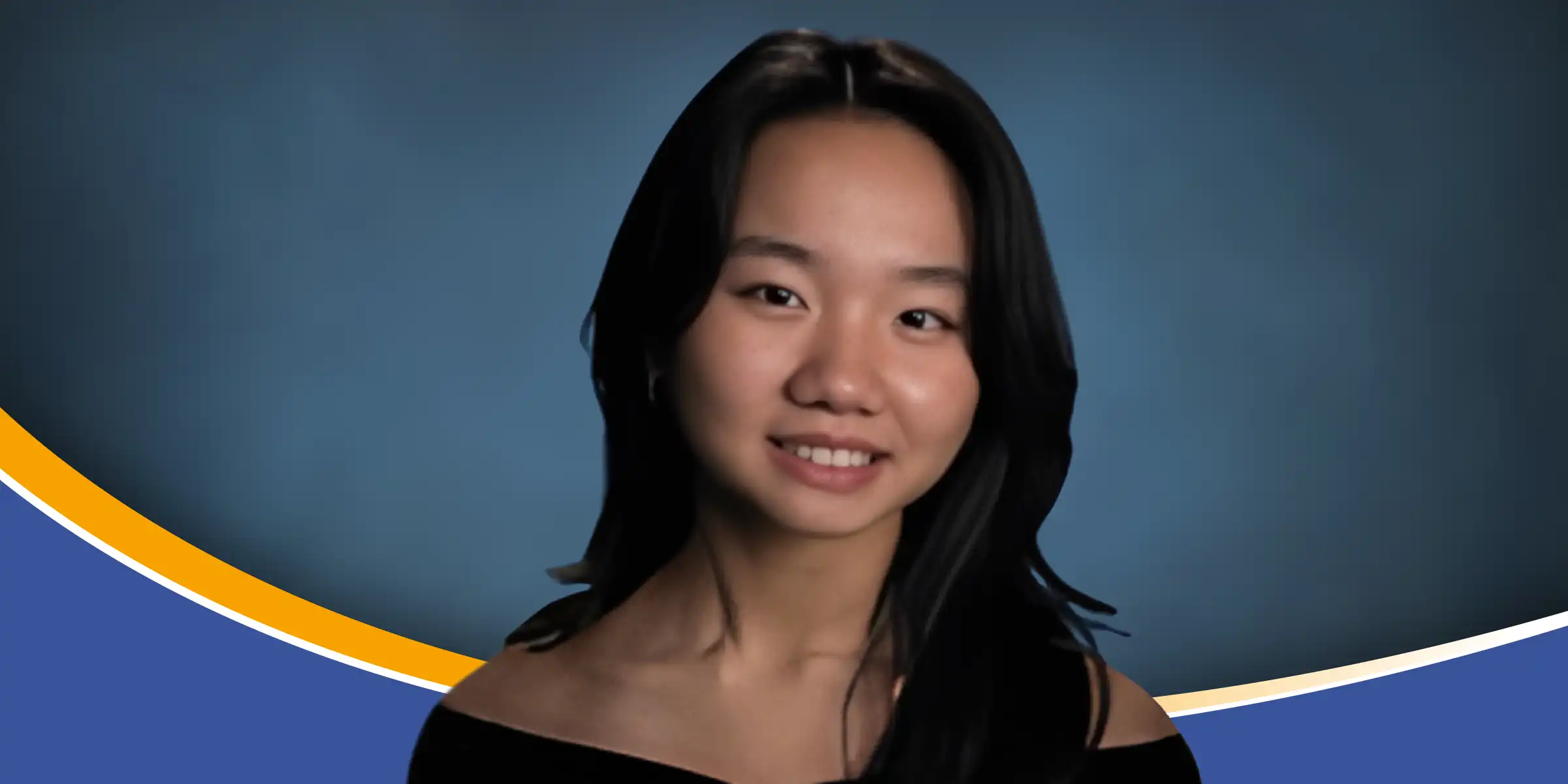 Headshot of a smiling young woman with long dark hair against a blue gradient background with curved gold and white accents at the bottom.
