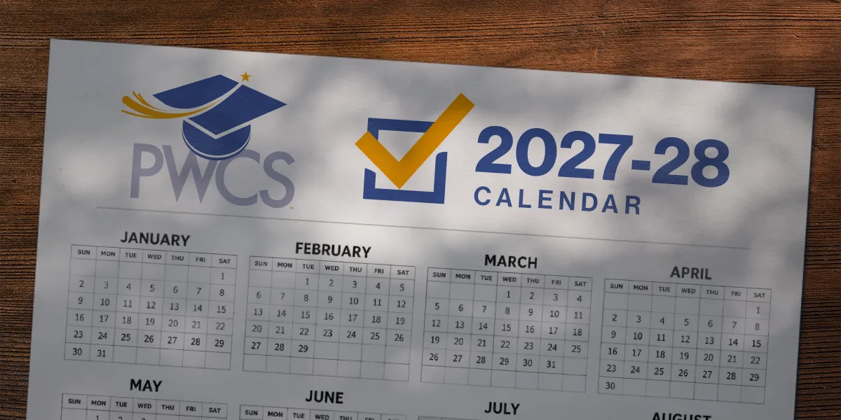 2028 calendar laying on a table with the PWCS logo, a checkbox, and the text 2027-28 calendar