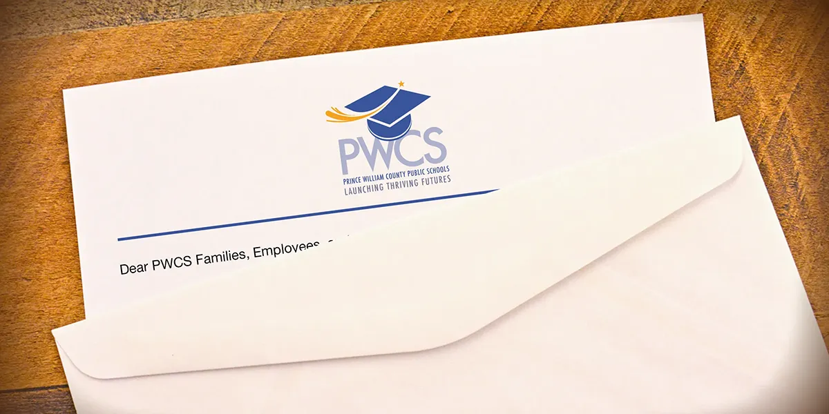 Letter and envelope with PWCS letterhead