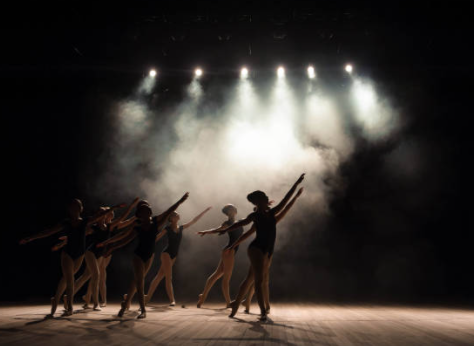 group of ballerinas dancing on stage group of ballerinas dancing on stage