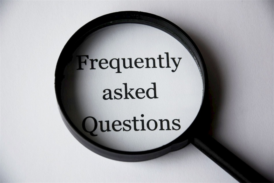 Photo of a magnifying glass on text that reads frequently asked questions Photo of a magnifying glass on text that reads frequently asked questions