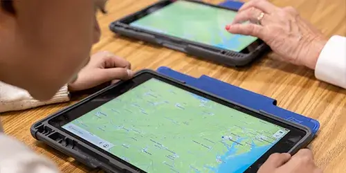 Students on iPad in a classroom