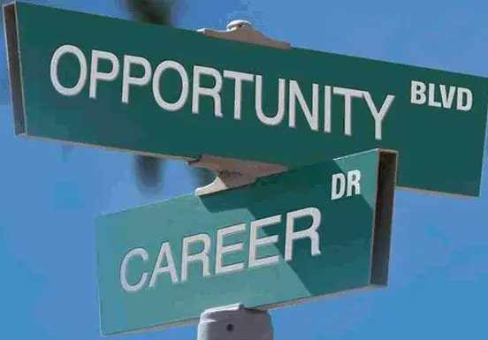 Street signs saying Opportunity Blvd and Career Ave.