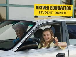 Student driver in a car