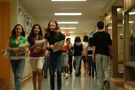 Students walking down a school hallway