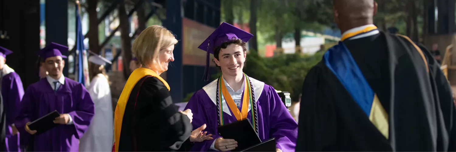 Battlefield high school graduate receiving diploma